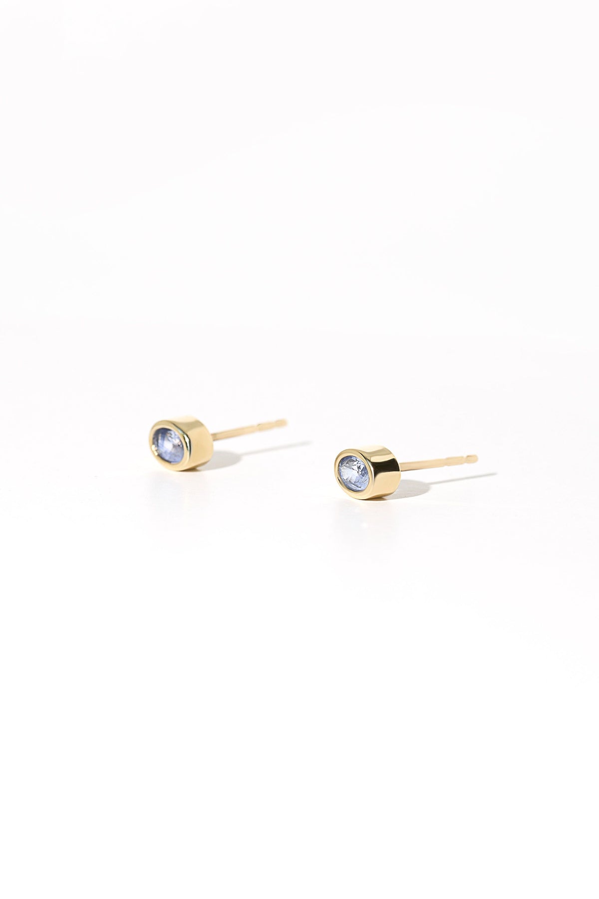 sanity:Sapphire Bezel Oval Studs