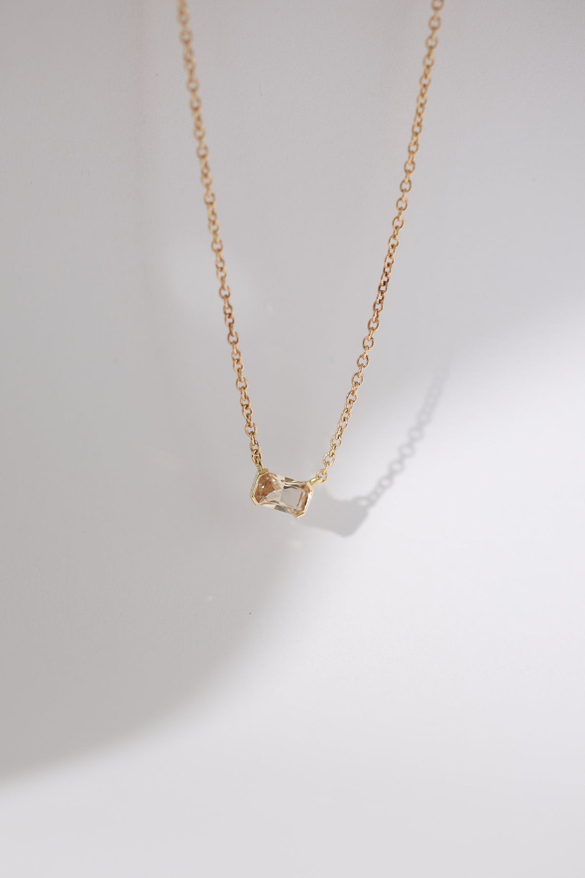 sanity:Half Bezel Sapphire Pendant