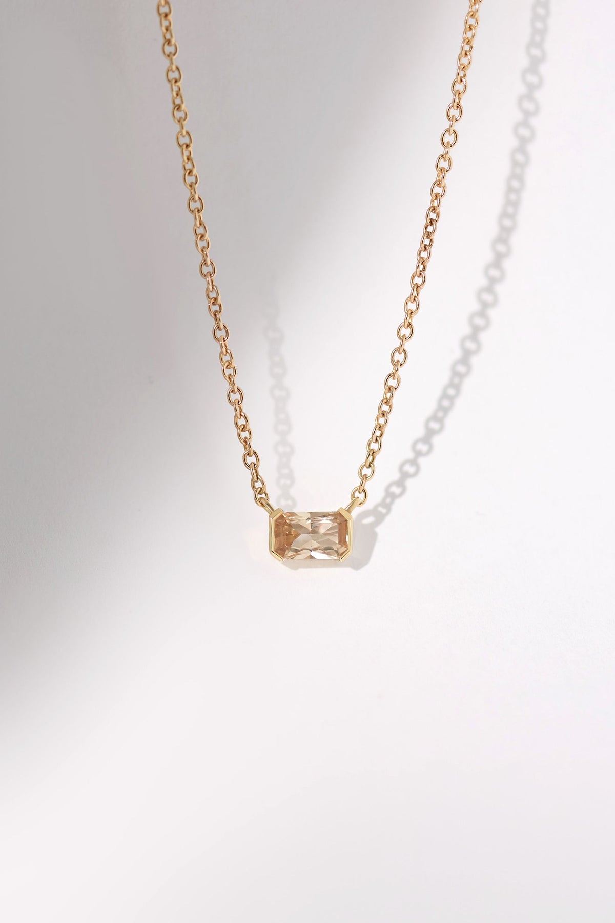 sanity:Half Bezel Sapphire Pendant